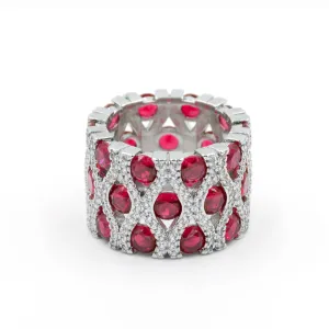 Anillo grueso con zirconias redondas rojo - plata 925